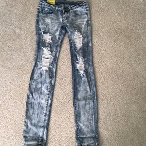 Machine low rise ripped jeans